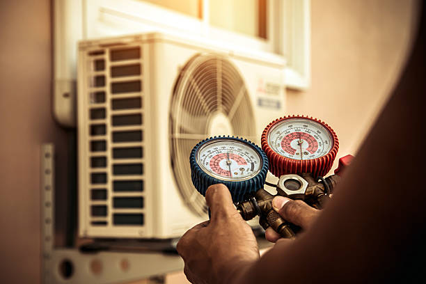 Professional Heat Pump Repair technician working in Boston, MA